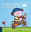 LAURA MONTA EN BICICLETA